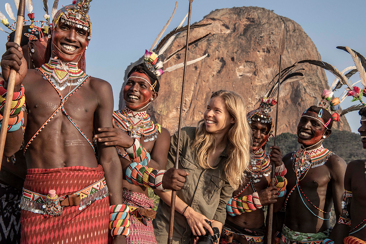 With Samburu warriors in Kenya smiling together